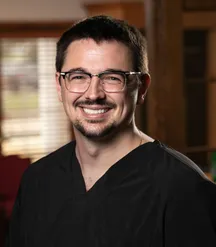 Dr. Parker Roustio, DMD
