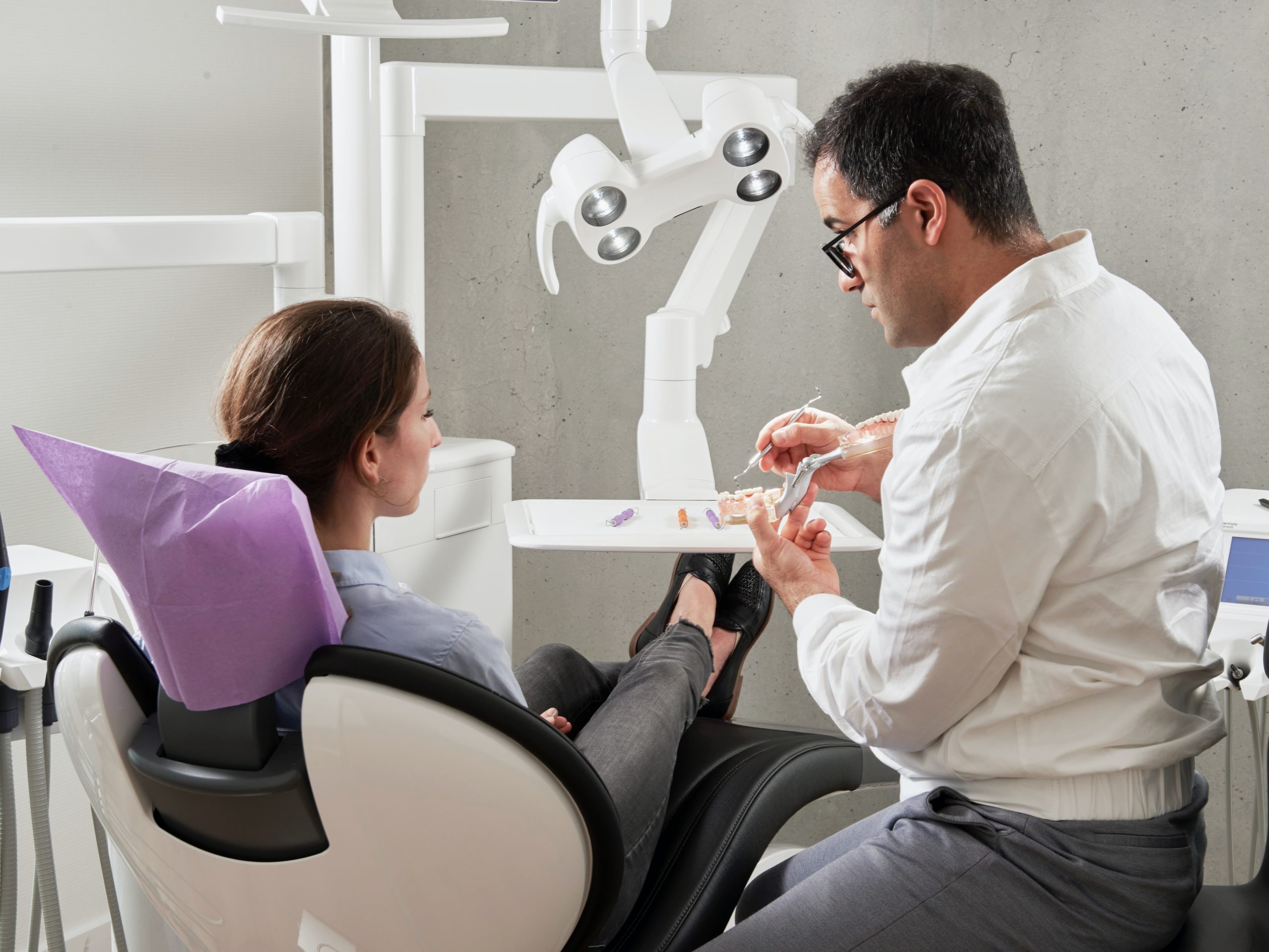 tooth extraction consultation between a dentist and patient